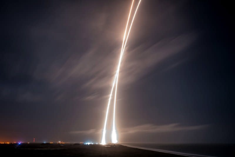 This long exposure shows the launch of the SpaceX Falcon 9 rocket and the safe return of the first stage of the rocket at Cape Canaveral, Fla., on December 21, 2015. File Photo courtesy of SpaceX