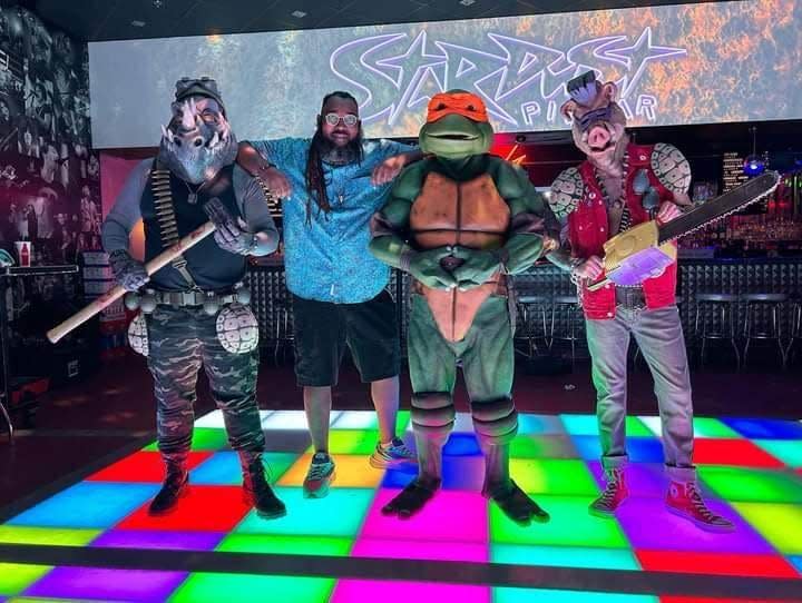 Teek Hall at the video shoot for 'Heroes in a Half Shell,' produced by Raisi K. The Teenage Mutant Ninja Turtle is Jason Ybarra, who tours with Vanilla Ice and appears in Turtle gear on "Ninja Rap."