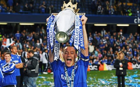 Chelsea's captain John Terry celebrates...Chelsea's captain John Terry celebrates with the Barclays Premier league trophy after they win the title with a 8-0 victory over Wigan Athletic in the English Premier League football match at Stamford Bridge - Credit: Getty Images
