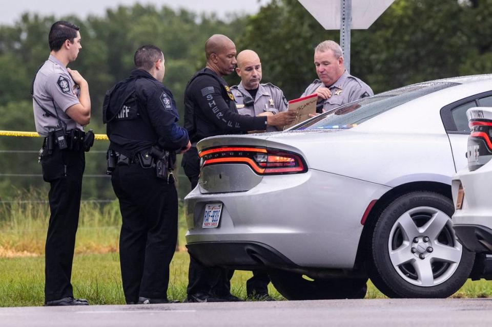 Wake County Sheriff deputies, work at the scene where a deputy was shot and killed in eastern Wake County near the intersection of Auburn Knightdale and Battle Bridge Road Friday, Aug. 12, 2022.