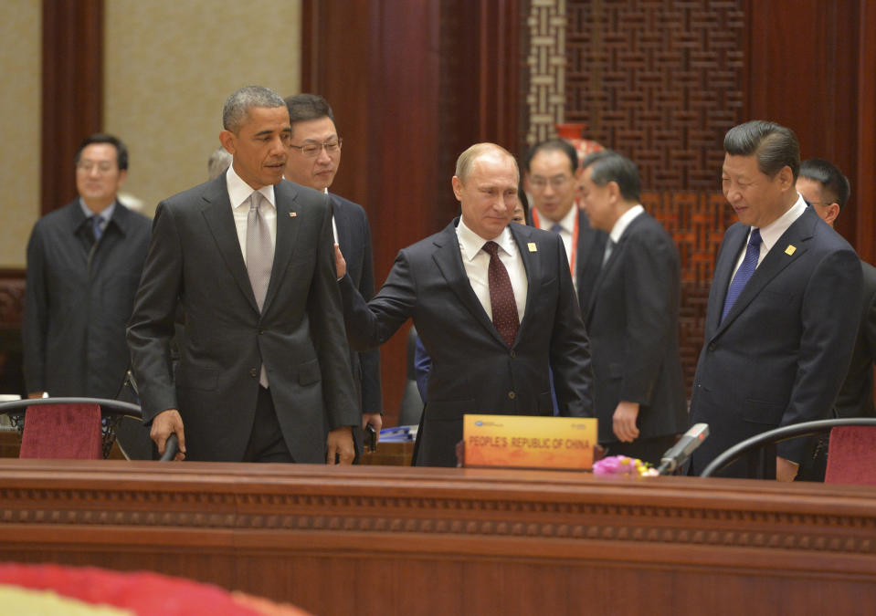 U.S. President Barack Obama, Russian President Vladimir Putin and Chinese President Xi Jinping