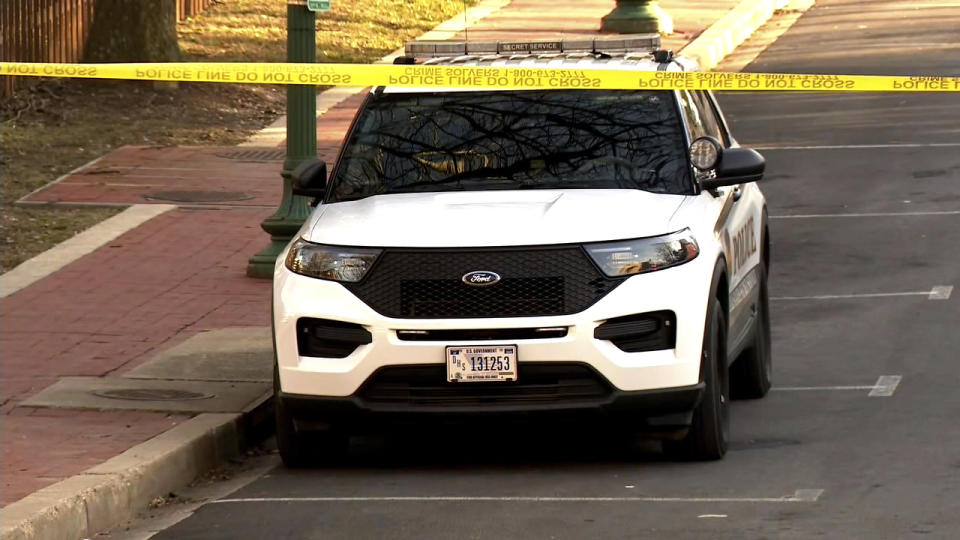 In this image taken from video, police are deployed outside the Israeli Embassy in Washington, Sunday, Feb. 25, 2024, after an active-duty member of the U.S. Air Force was critically injured after setting himself ablaze outside the diplomatic compound. (WJLA via AP)