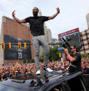 Cleveland Cavaliers Kyrie Irving celebrates the Cavaliers 2016 NBA Championship during a parade in downtown Cleveland, Ohio, U.S. June 22, 2016. REUTERS/Aaron Josefczyk