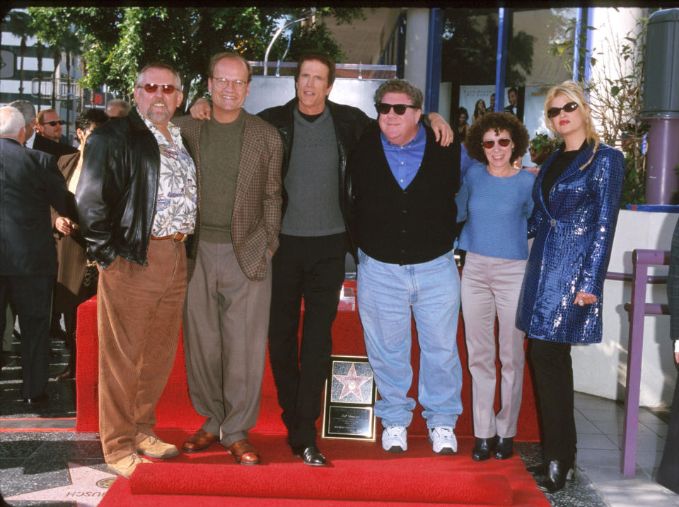 <em>Cheers</em> cast members John Ratzenberger, Kelsey Grammer, Ted Danson, George Wendt, Rhea Perlman and Kirstie Alley gather as Danson is inducted into the Hollywood Walk of Fame in 1999. (Photo: Steve Granitz/WireImage)