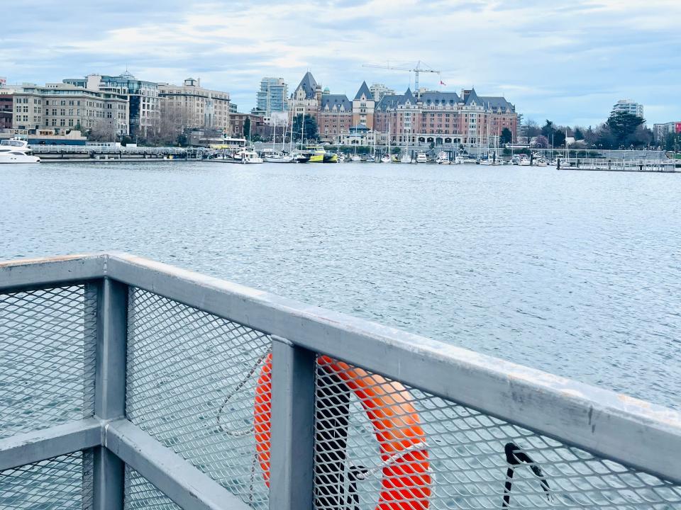 view of victoria from a ferry dock on the water