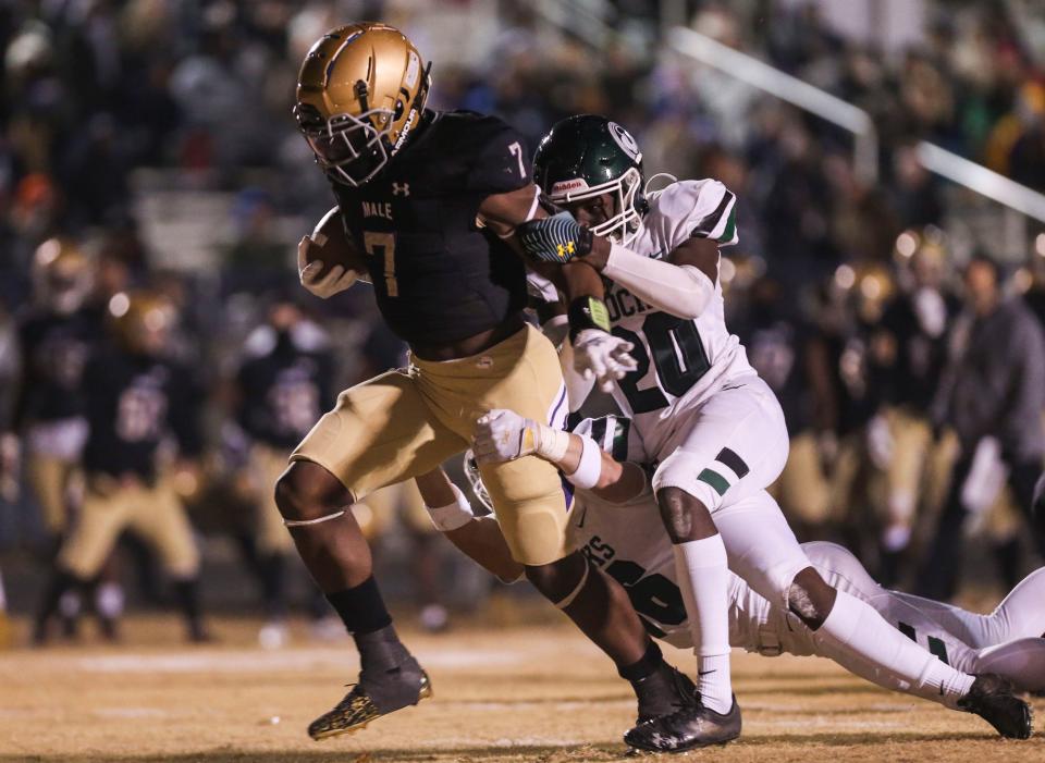 Male's Daniel Swinney ran for his first of five first half touchdowns against Trinity during the Class 6a state semifinal Friday night at Male High School. Nov. 26, 2021