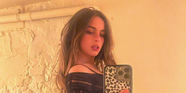 Addison Rae Sneakily Posted a Selfie in a Sheer Knit Dress and Bedhead