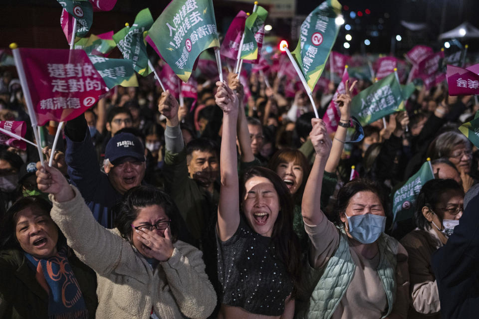 The crowd cheers at a Democratic Progressive Party rally in Taipei, Taiwan, Saturday, Jan. 13, 2024. The ruling DPP party candidate Lai Ching-te emerged victorious in Taiwan’s presidential election on Saturday and his opponents conceded, a result that will chart the trajectory of the self-ruled democracy’s relations with China over the next four years. (AP Photo/Louise Delmotte)