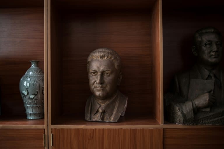 A bust of Pakistani nuclear scientist A.Q. Khan -- such memorials are a rare source of foreign currency for North Korea