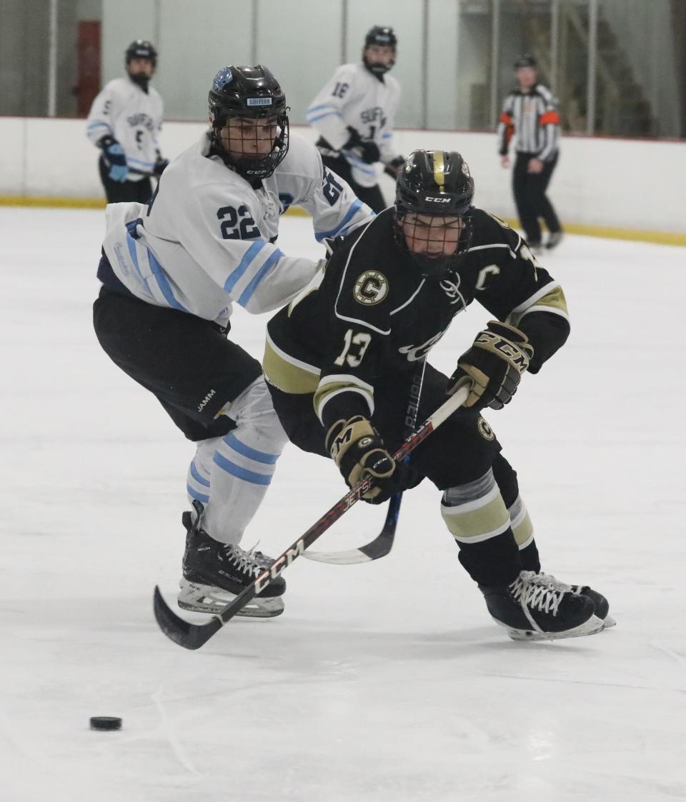 Cole Tryell from Suffern and Sam Sobler from Clarkstown in action during the Suffern vs. Clarkstown Section One Division I hockey championship at the Brewster Ice Arena, Feb. 25, 2024.