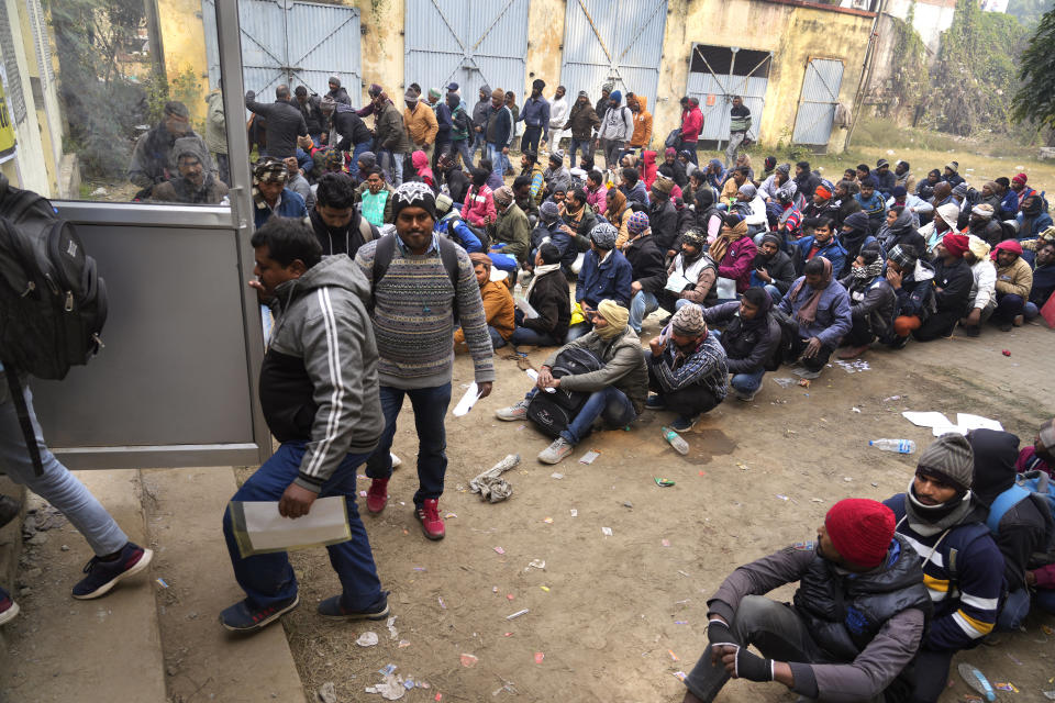 Indian workers aspiring to be hired for jobs in Israel line up during a recruitment drive in Lucknow, India, Thursday, Jan. 25, 2024. (AP Photo/Rajesh Kumar Singh)