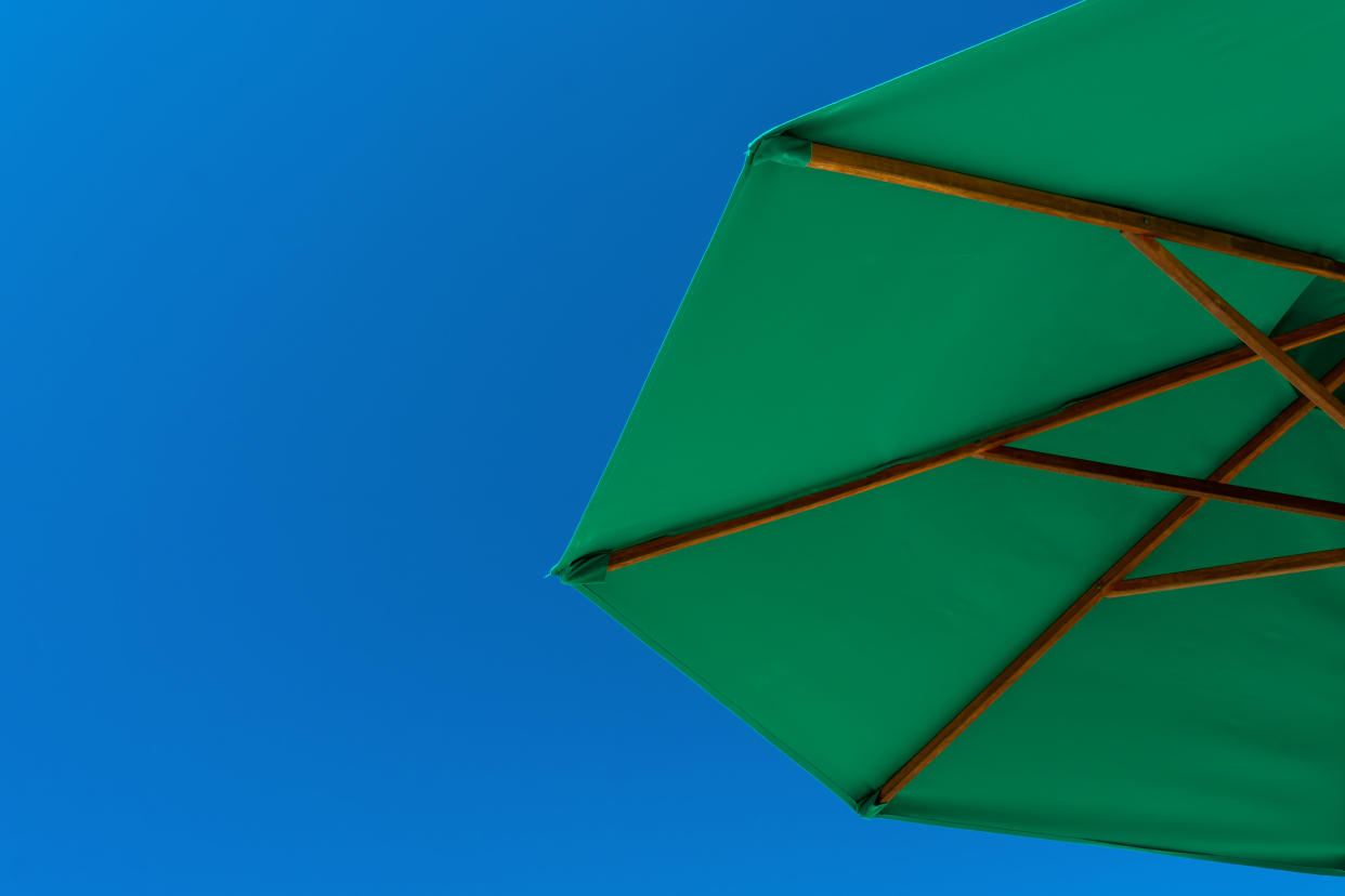 The Sport-Brella beach umbrella has more than 5,000 5-star Amazon reviews (Photo: Getty)
