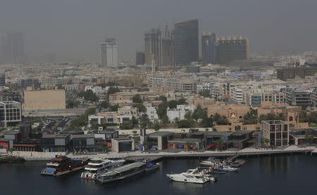 Aerial view of Dubai from the Deira old Dubai side in Dubai, UAE July 9, 2018. Picture taken July 9, 2018. REUTERS/Satish Kumar