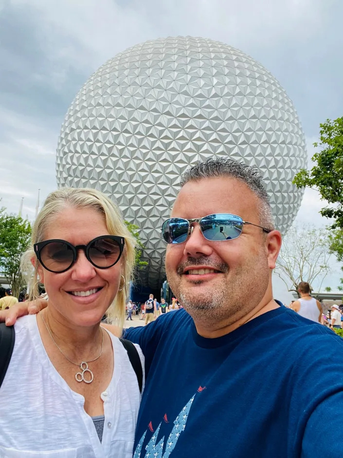 Greg Antonelle and his wife Elyssa Antonelle at Epcot in Orlando, Florida.