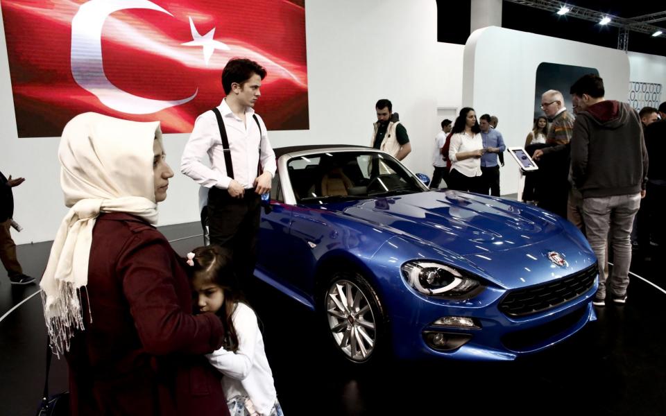 Fiat's 124 Spider on display at the Istanbul motor show - Credit: Bloomberg