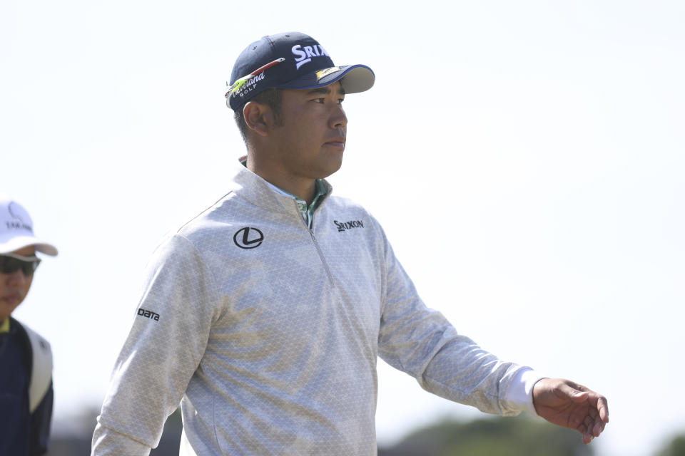 Japan's Hideki Matsuyama walks from the 2nd tee during the third round of the British Open golf championship on the Old Course at St. Andrews, Scotland, Saturday July 16, 2022. (AP Photo/Peter Morrison)