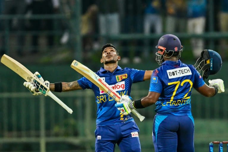 Sri Lanka's Pathum Nissanka (L) celebrates after scoring a double century (Ishara S. KODIKARA)