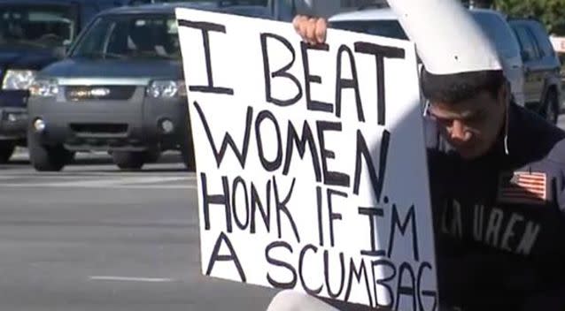 Alisha Hessler gave her attacker a choice - hold this sign on a busy road for eight hours or face jail time. Photo: ABC News