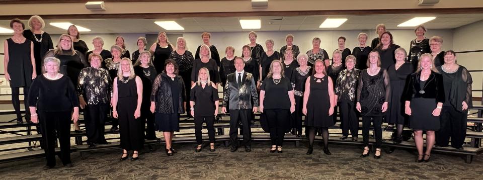 The Metro Mix Chorus all dressed up for a performance.