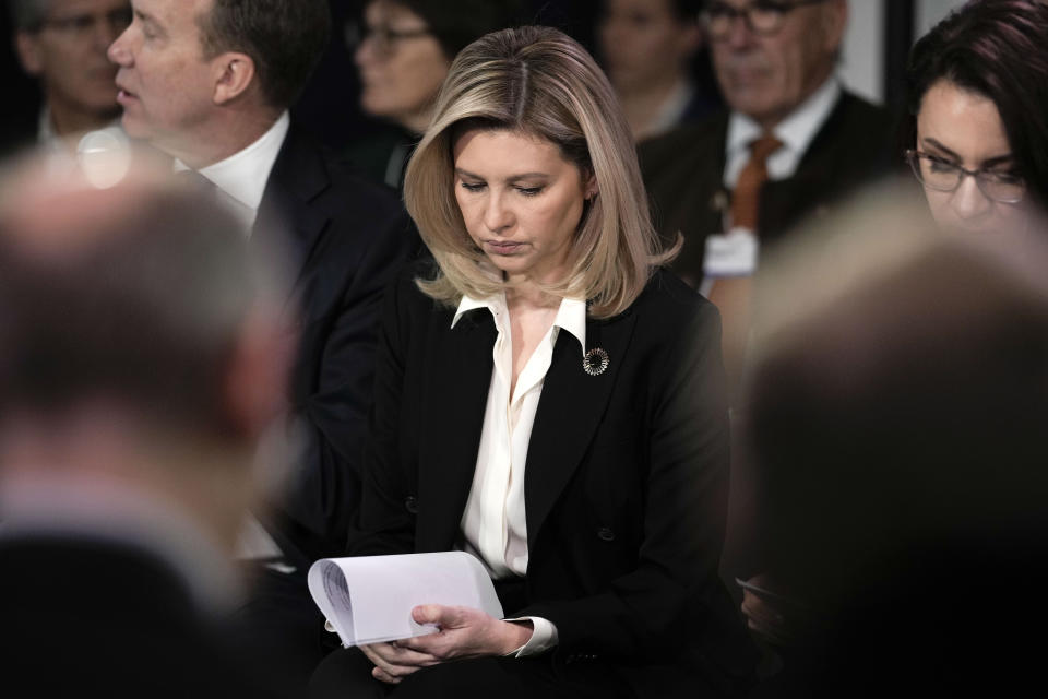 First Lady of Ukraine Olena Zelenska is pictured during a minute of silence at the World Economic Forum in Davos, Switzerland, for the victims of a helicopter crash in Ukraine, where Minister of Internal Affairs Denys Monastyrsky died among others on Wednesday, Jan. 18, 2023. The annual meeting of the World Economic Forum is taking place in Davos from Jan. 16 until Jan. 20, 2023. (AP Photo/Markus Schreiber)