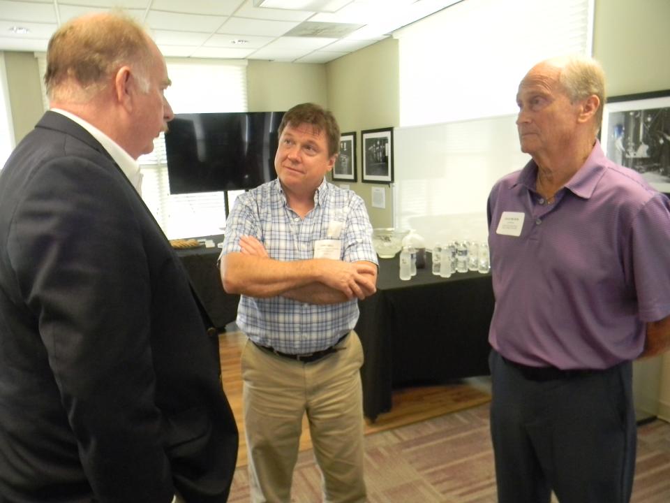 Oak Ridge Deputy City Manager Jack Suggs, from left, talks to Gary Bell, director, TRISO-X Facility Design & Integration, and Oak Ridge Industrial Development Board President David Wilson.