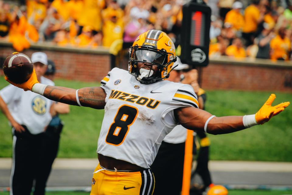 Missouri running back Nate Peat celebrates as he scores a touchdown during a game against Abilene Christian on Sept. 17, 2022, in Columbia, Mo.