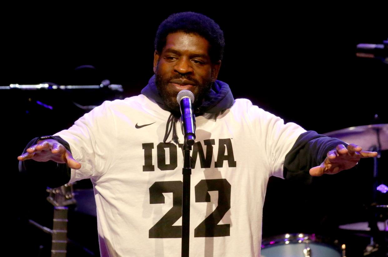 Hanif Abdurraqib speaks to the crowd ahead of his book reading at the Mission Creek Festival Thursday, April 4, 2024 at Hancher Auditorium in Iowa City, Iowa.