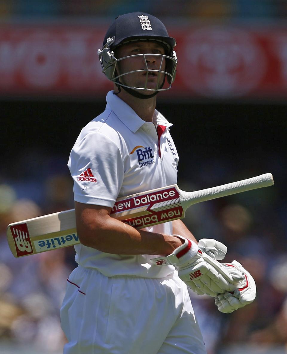 England's Jonathan Trott walks off the field after his dismissal by Australia's Mitchell Johnson during the second day's play of the first Ashes cricket test match in Brisbane November 22, 2013. REUTERS/David Gray (AUSTRALIA - Tags: SPORT CRICKET)