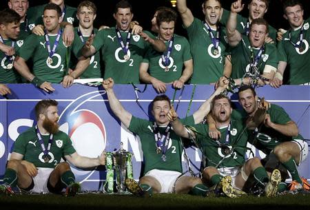 Ireland's players celebrate victory against France at the end of their Six Nations rugby union match at the Stade de France in Saint-Denis, near Paris, March 15, 2014REUTERS/Gonzalo Fuentes