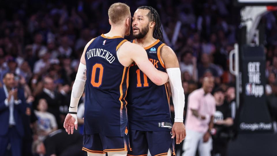 May 8, 2024; New York, New York, USA; New York Knicks guards Donte DiVincenzo (0) and Jalen Brunson (11) embrace after defeating the Indiana Pacers 130-121 in game two of the second round for the 2024 NBA playoffs at Madison Square Garden. 