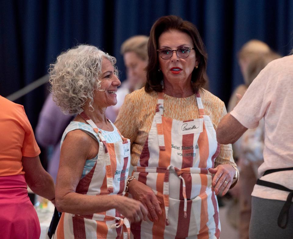 Jo Anne Burkholder, left, and Priscilla Schmeelk co-chaired the 2023 St. Edward Guild Treasures of the Island Sale in March. Burkholder will chair the church's Christmas Dinner Dance on Dec. 6.