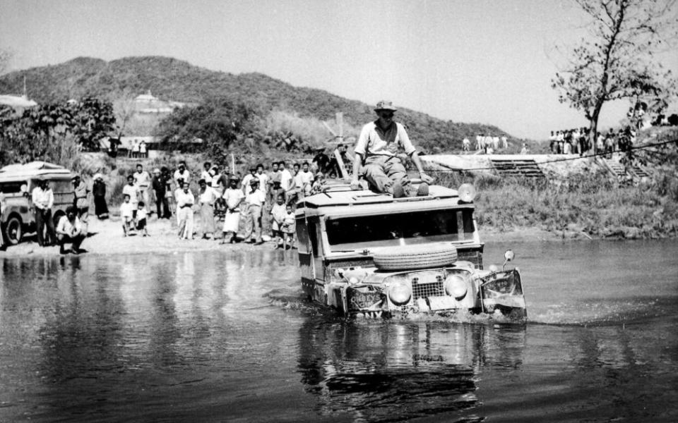 A Series 1 Land Rover wading a river between Burma and Thailand - ANTONY BARRINGTON BROWN