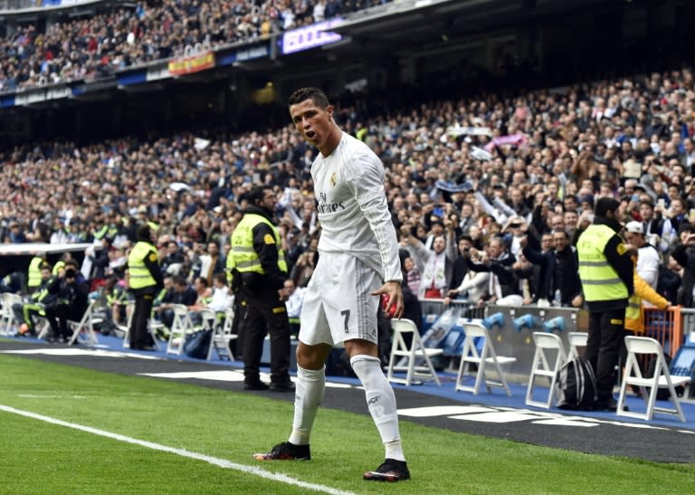 Real Madrid's Portuguese forward Cristiano Ronaldo celebrates after scoring during the match against Athletic Club Bilbao in Madrid on February 13, 2016