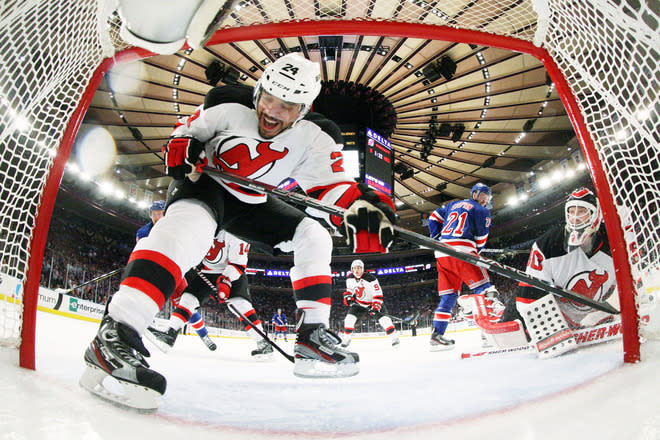 NEW YORK, NY - MAY 23: Bryce Salvador #24 and Martin Brodeur #30 of the New Jersey Devils defend against the New York Rangers in the second period of Game Five of the Eastern Conference Final during the 2012 NHL Stanley Cup Playoffs at Madison Square Garden on May 23, 2012 in New York City. (Photo by Bruce Bennett/Getty Images)