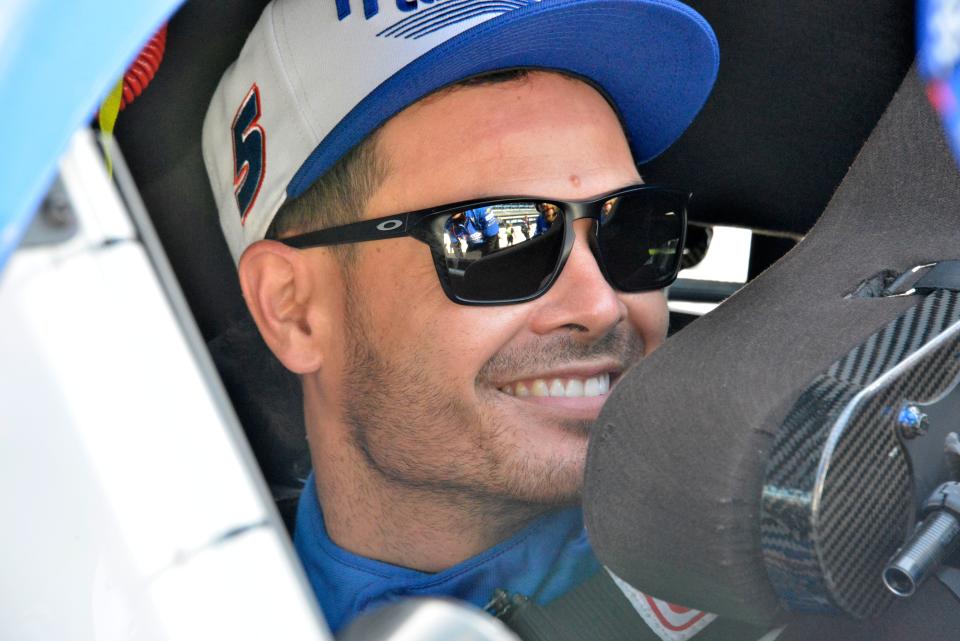 NASCAR Cup Series driver Kyle Larson (5) sits in his car Saturday, July 30, 2022, during practice for the Verizon 200 at the Brickyard at Indianapolis Motor Speedway.