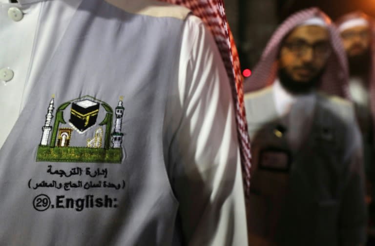 A translator prepares to help Muslim pilgrims in the Saudi holy city of Mecca on August 17, 2018, ahead of the start of the hajj pilgrimage