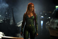 This image released by Warner Bros. Pictures shows Amber Heard in a scene from "Aquaman." (Jasin Boland/Warner Bros. Pictures via AP)