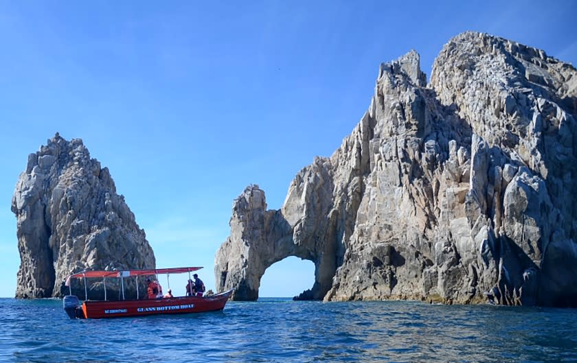 BAJA CALIFORNIA SUR, MEXICO - Water taxi approaches El Arco, Cabo San Lucas, 2015. (Christopher Reynolds/Los Angeles Times)