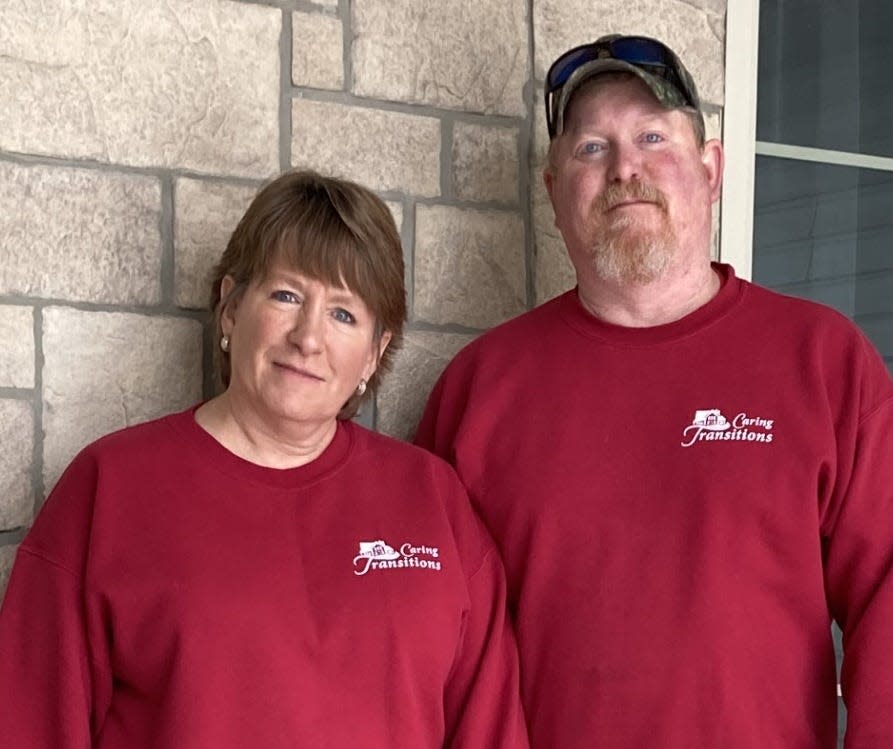 Mary Kay Minnis, owner of Caring Transitions of Northeast Wisconsin, and her husband, Paul.