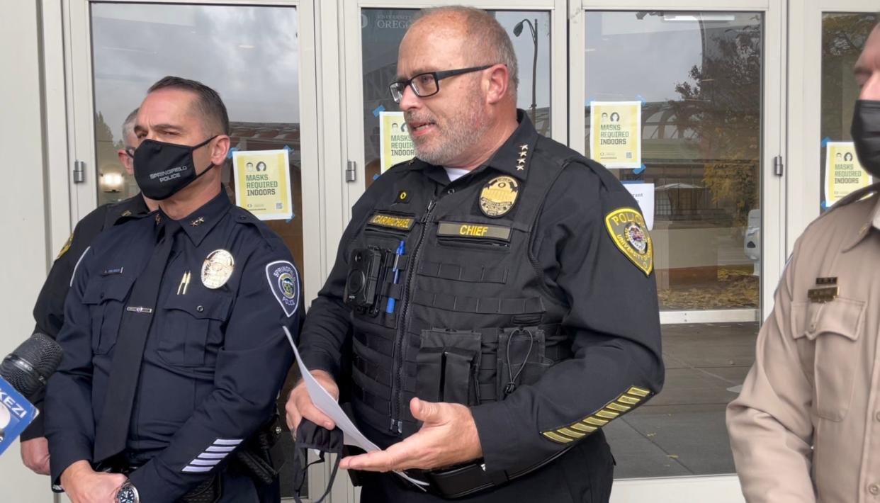 University of Oregon Police Chief Matthew Carmichael talks to the media about the armed suspect who allegedly held students captive in a dorm room.