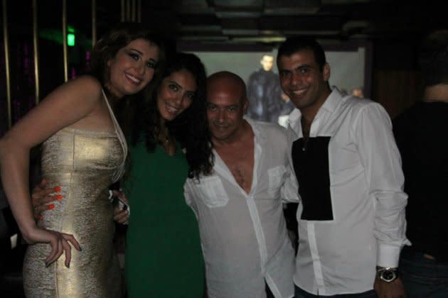 Egyptian model Yara Naoum (far left) celebrate her 25th birthday alongside husband footballer Emad Meteb (far right).