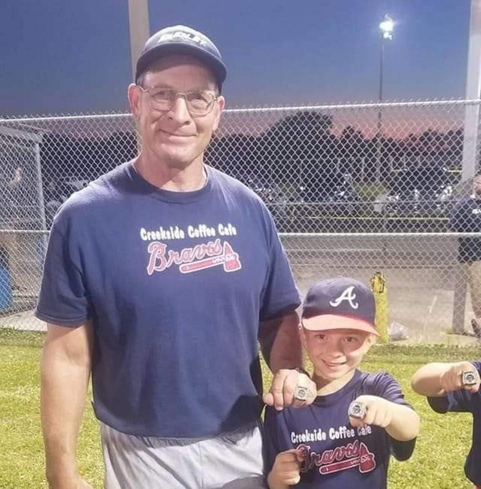 Jerry Todd, right, of Picayune, was shot Wednesday night while watching Cruisin’ the Coast traffic on U.S. 90. He is pictured here with his grandson, Emmanuel ‘Manny’ Todd, at a T-ball game in Picayune.