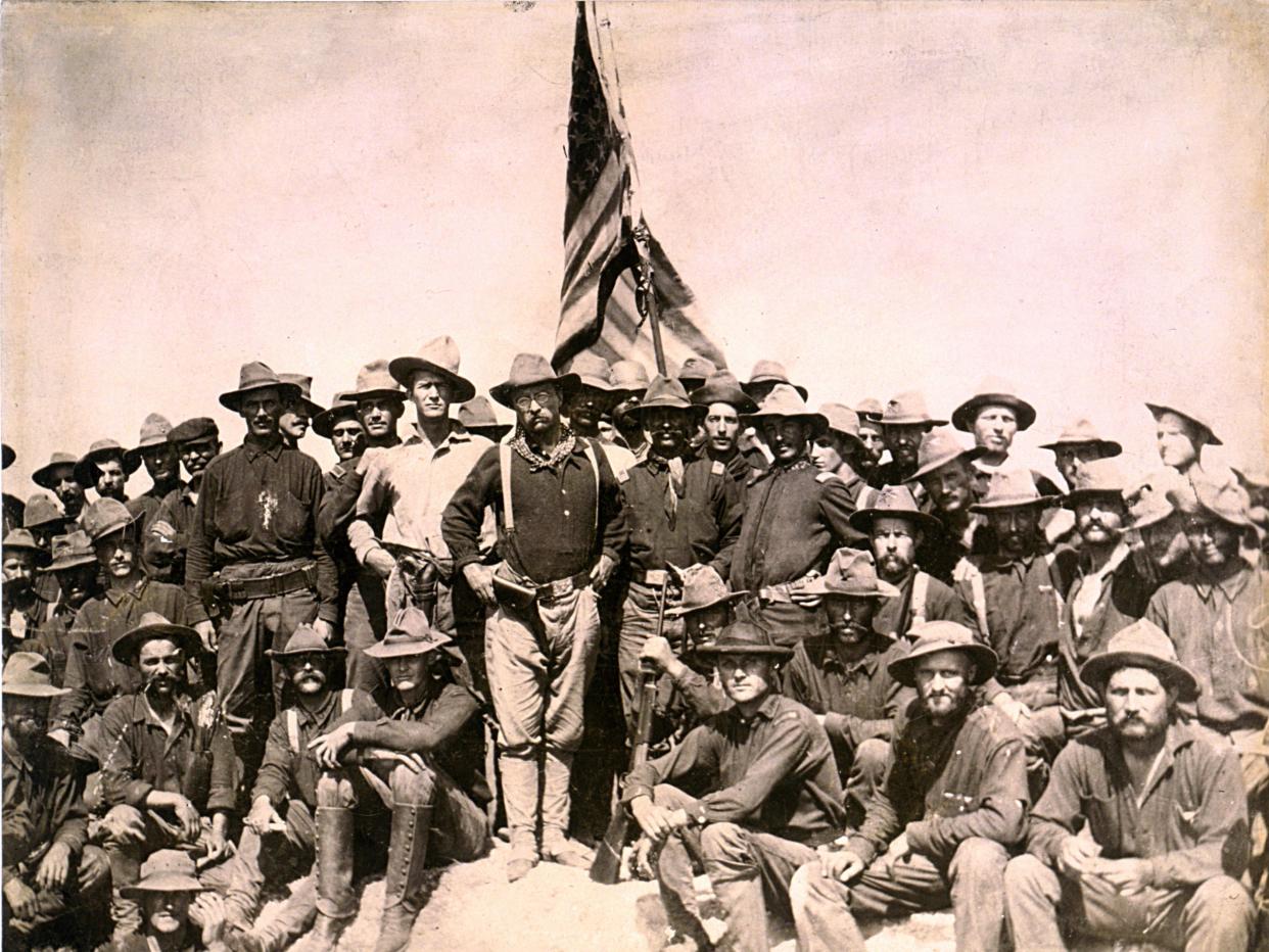 “Colonel Roosevelt and his Rough Riders at the top of the hill which they captured, Battle of San Juan”