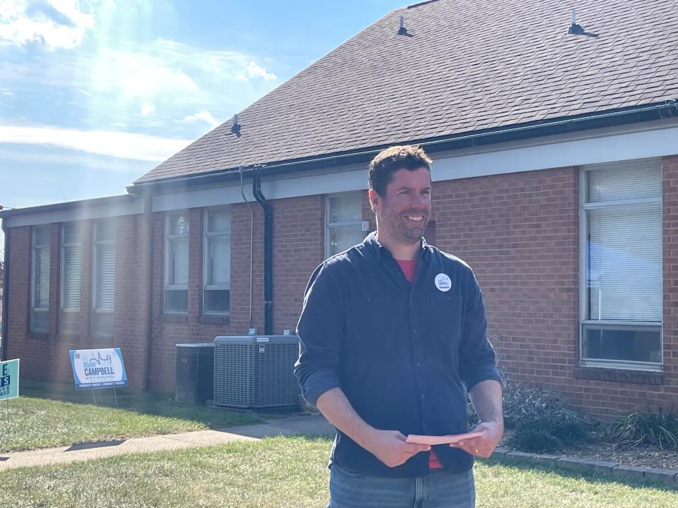 Adam Campbell, candidate for Staunton City Council, stands outside the Ward 1 polling site at Third Presbyterian Church, passing out sample ballots.