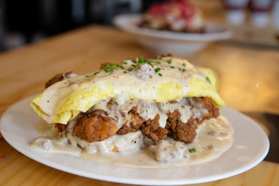 The Big Country is a breakfast dish of housemade biscuits topped with fried chicken, sausage gravy and eggs at Jersey Shore BBQ in Point Pleasant Beach.