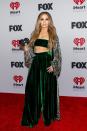 <p>The actress looked glamorous in an emerald green bandeau top with matching pants at the iHeartRadio Music Awards.</p>