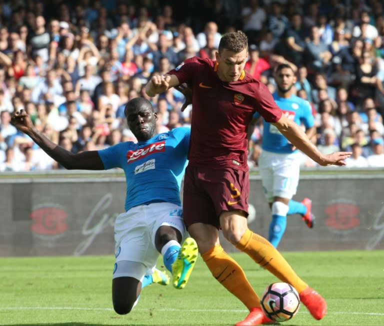 Edin Dzeko (right) took his Serie A tally to seven with a brace for Roma in a 3-1 at Napoli on October 15, 2016