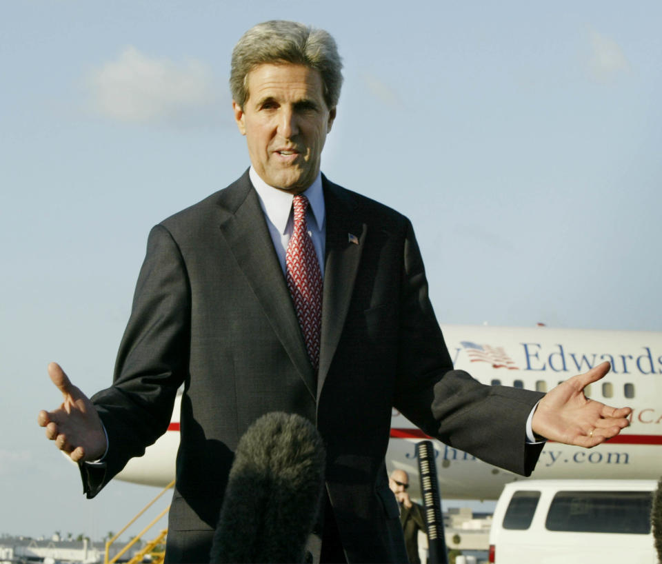 Democratic presidential nominee John Kerry speaks to reporters at the airport in West Palm Beach, Florida, October 29, 2004. Kerry made a statement about the recently released tape purportedly recorded by Osama bin Laden. REUTERS/Brian Snyder US ELECTION  BS