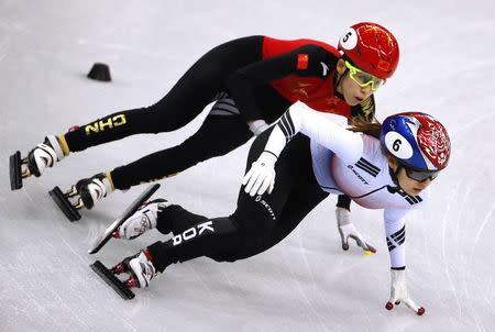 Short Track Speed Skating Events - Pyeongchang 2018 Winter Olympics - Women's 3000 m Final - Gangneung Ice Arena - Gangneung, South Korea - February 20, 2018. Minjeong Choi of South Korea and Fan Kevin of China in action. REUTERS/Phil Noble