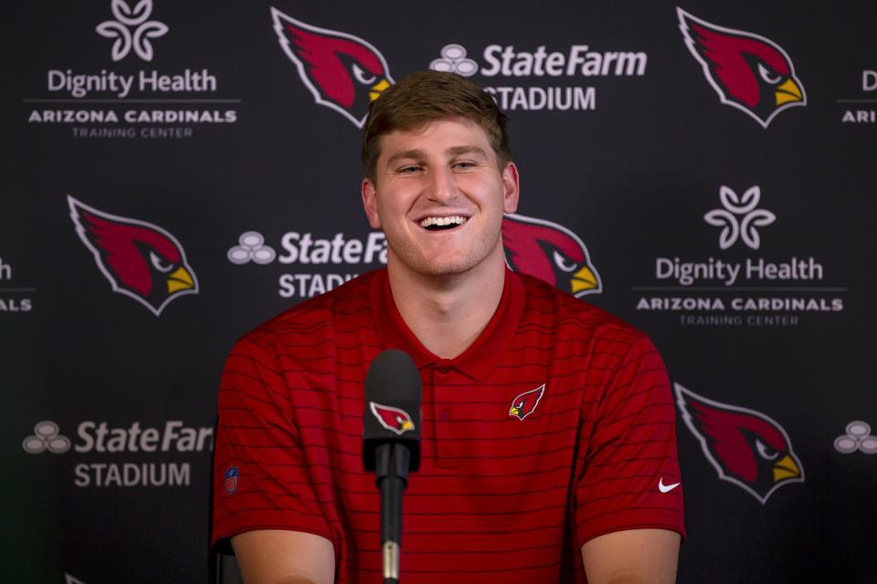 Cameron Thomas, one of the newest draft picks for the Arizona Cardinals, laughs during a press conference held at the Dignity Health Arizona Cardinals Training Center in Tempe on May 12, 2022.